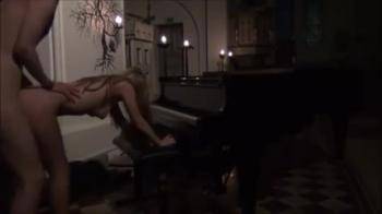 video of Blonde college GF gets her ass fucked against the piano