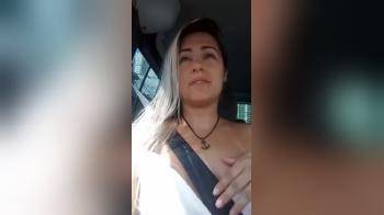 video of Perfect tit flash in the car by latina girl