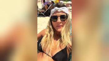 video of sexy bikini girl on the beach sunbating