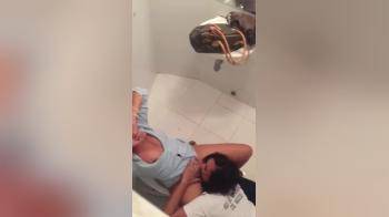 video of Latina lesbians in public toilet