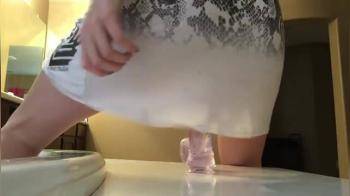 video of Riding her pink dildo in bathroom