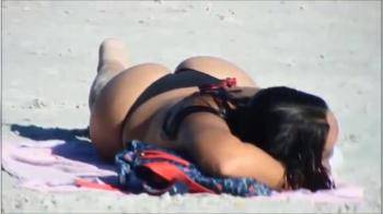 video of Perfect ass on the beach in black bikini