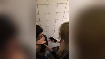 video of Secretly filming these two lesbian girls going at it on party toilet