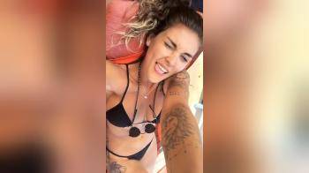 video of sexy latina in bikini laying down