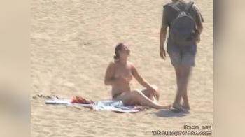 video of Topless cutie on beach