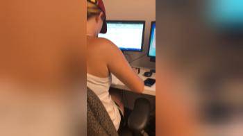 video of Taking out her tits in the office while working