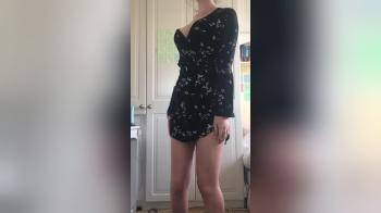 video of Really cute brunette in dress strips slowly naked