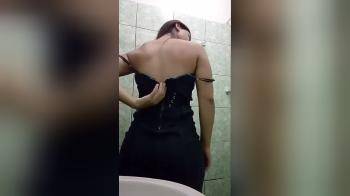 video of Latina stripping naked in her bathroom 