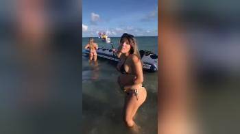 video of Another hot girl in her bikini on the beach