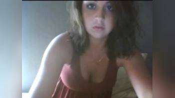 video of Cam brunette beauty strips plays 