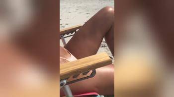 video of Perfect body tanning at the beach