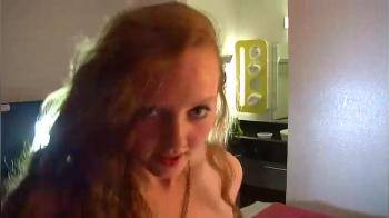 video of Curly redhead loves to give a show then she rides a cock