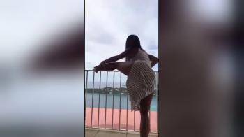 video of She twerks on balcony topless what a girl