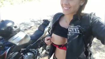 video of Motorcycle girl shows tits and hairy pussy 