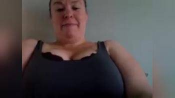 video of busty teacher shows off her big tits and hourglass body