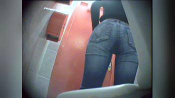 video of Hidden cam on public toilet girl pees 