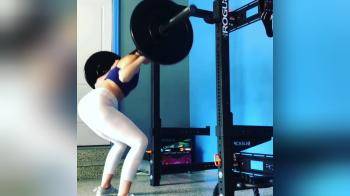 video of squatting in her personal gym