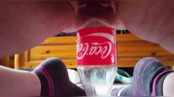 video of chubby wife riding a cola bottle 