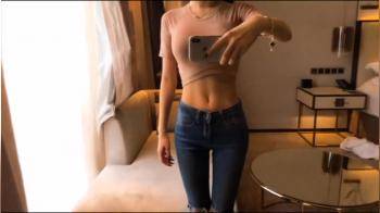 video of skinny beauty filming herself in the mirror