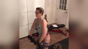 video of Nerdy brunette doing fitness workout