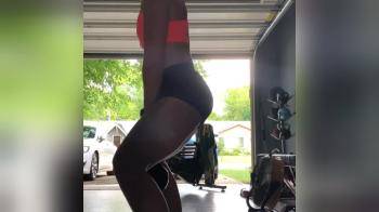 video of doing squats in the garage 
