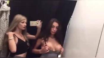 video of Two hot girlfriends having fun in public dressing room