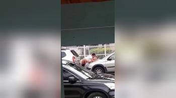 video of Couple fucking on the hood of a car secretly filmed it