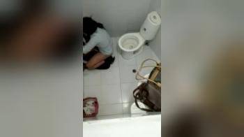 video of Two girls fingering each other on public toilet