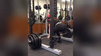 video of Hot chick dead lifting in the gym