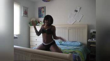 video of Black girl undresses on bed