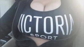 video of Flashing her enormous  tits in the car
