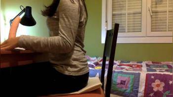 video of studying then rides her dildo