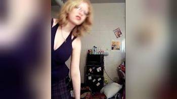 video of Geeky blonde strips in dorm room