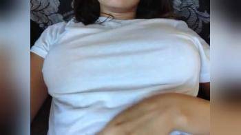 video of Slowly reveals her big tits