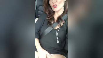 video of MILF rubbing her pussy in the car