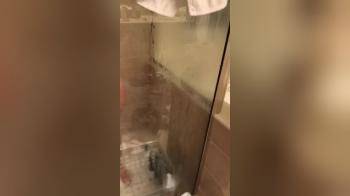 video of Wife washing her hair under the shower
