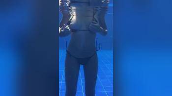 video of Reveals her tits underwater