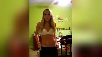 video of Teen takes off her bra