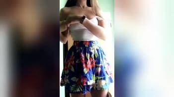 video of Stripping down her top and skirt totally naked