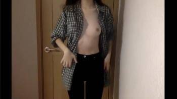 video of Stripping down naked next to the door