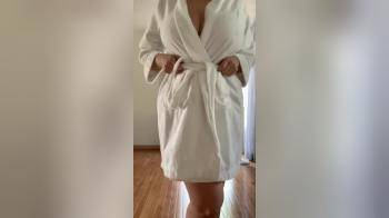 video of Taking off her robe