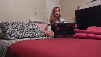 video of Cute blonde girl watching laptop porn and masturbating with hitachi on the bed