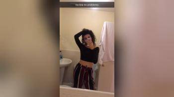video of curly brunette in bathroom no bra no problems