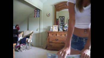 video of brunette with sunglasses sexy dance in the attic