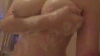 video of Playing with her wet soapy tits in bathroom