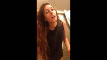 video of Cute brunette in bathroom strips to lingerie