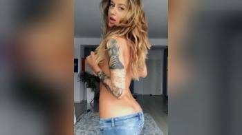 video of Hot tattooed girl showing off her tits