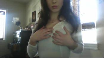video of Pretty brunette shows her pierced nipples 