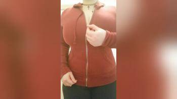 video of unzipping red hoodie
