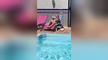 video of Sunbathing Naked at the poolside